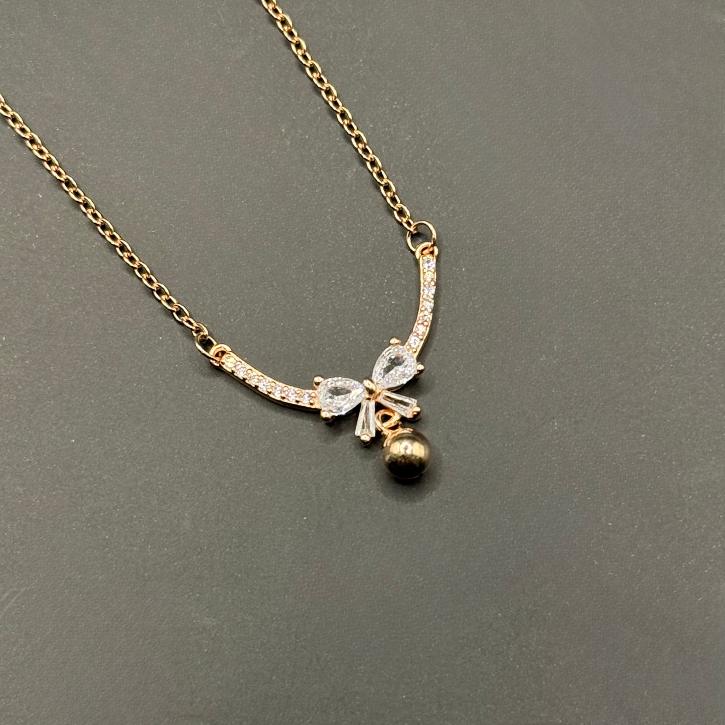 Bow and Orb Necklace