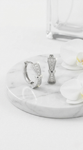 Lumi Knot Huggie Hoops | 925 Sterling Silver
